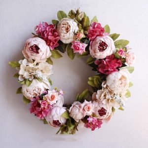 Artificial floral wreath with elegant design