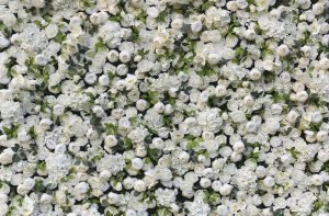 Blog 1 Artificial wedding flower arch, flower wall, and table centerpieces for event rental companies calculating floral inventory ROI